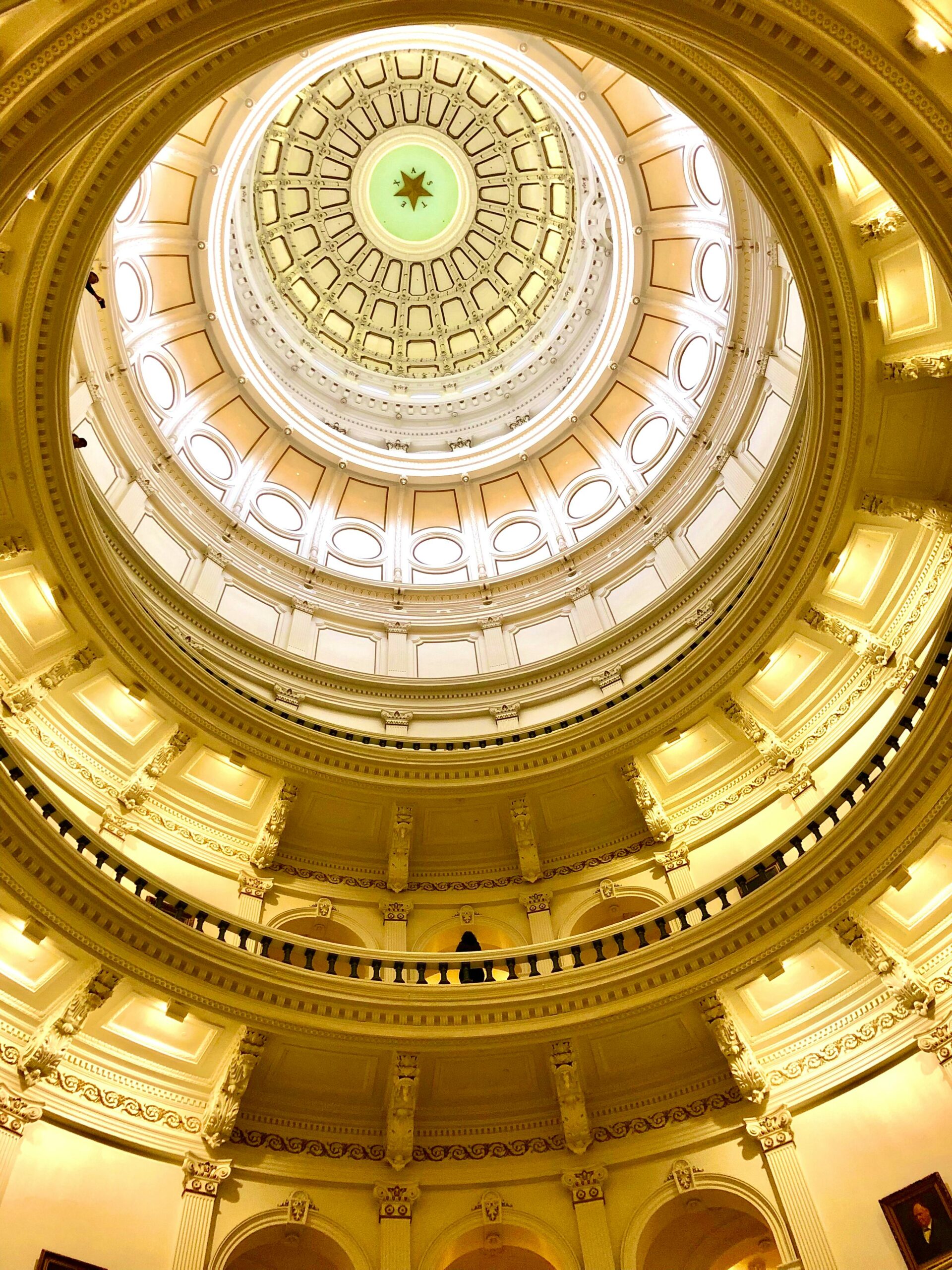 Stunning view of the ornate dome inside the Texas State Capitol in Austin.